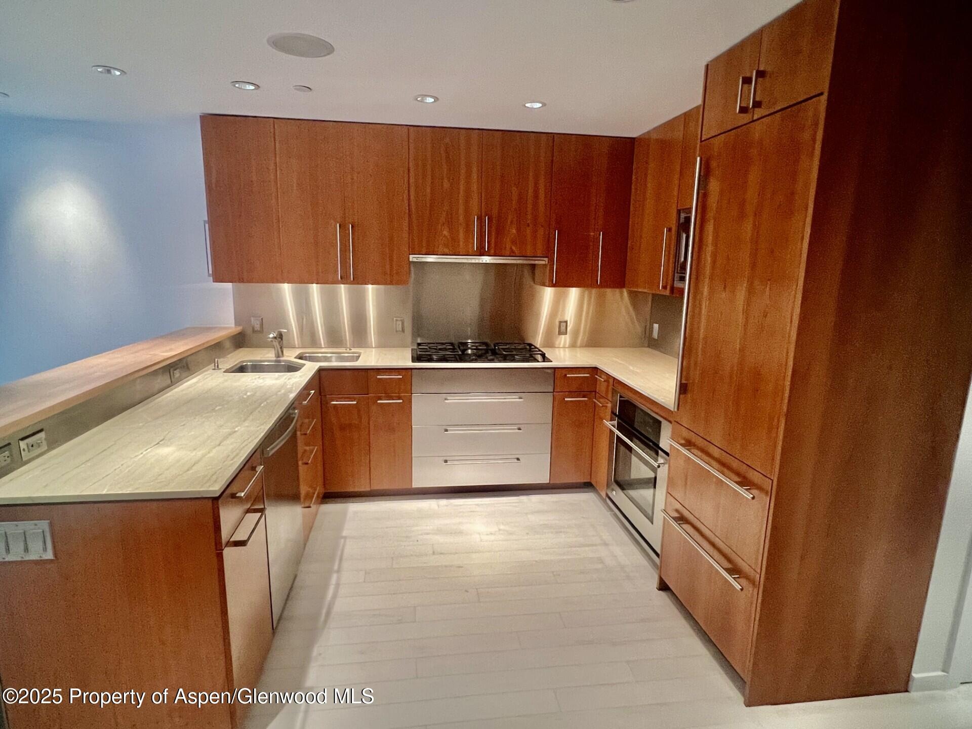 100 E Cooper Avenue 2